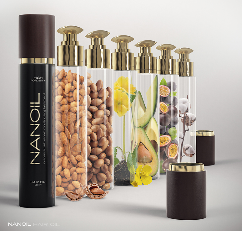 A bottle of Nanoil Hair Oil next to several flasks containing nuts, cotton and almond slices